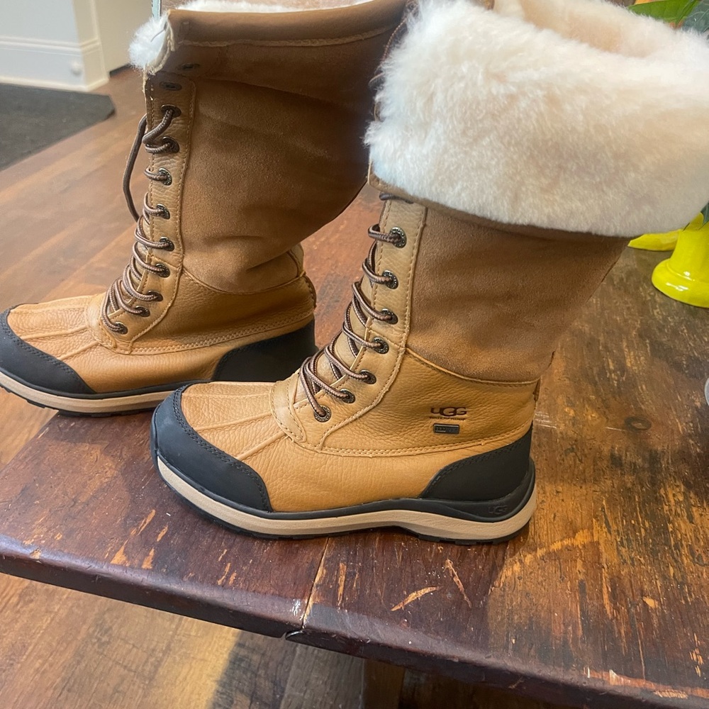 New never worn Ugg waterproof Snow boots .. rain boots Winter boots Etc..